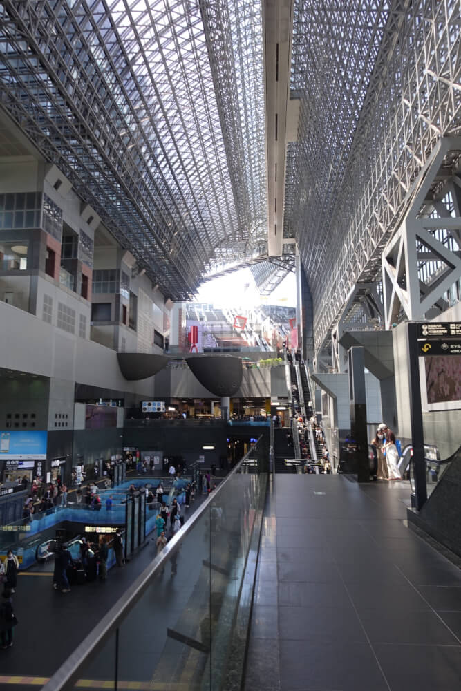 A view of the futuristic train station hall in Kyoto.